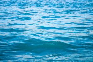 abstract background of seawater flow under light exposure photo