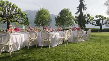 An Elegant Outdoor Dining Setup with a Scenic View Perfect for Any Occasion and Celebration. Action video
