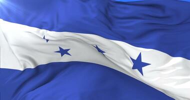 Flag of Honduras waving at wind with blue sky in slow, loop video