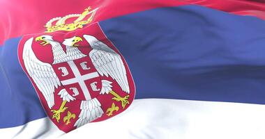Serbia flag waving at wind in slow with blue sky, loop video
