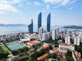 XIAMEN, CHINA -FEB 14, 2025-Aerial view of Shimao Twin Tower, the landmark in Xiamen, Fujian Province, China photo