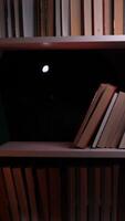 A book shelf with a light on it video