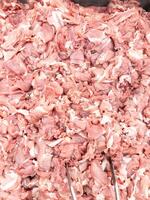 Sliced Pork Hip in Metal Tray at Market. photo