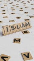Vertical Animation of the Word Islam Formed with Scrabble Tiles on a Marble Surface video