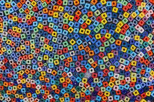 Wide Shot of colorful square bead paving on public walkway, abstract mosaic texture background representing urban diversity and creativity. photo