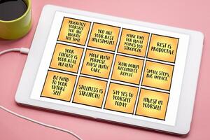 Invest time in yourself - a set of inspirational reminder notes with tips and guidelines on a digital tablet. photo