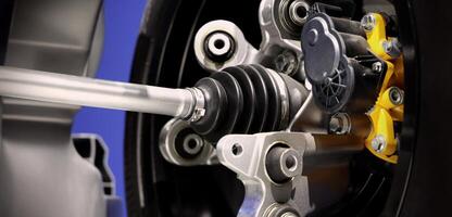 Close up, of a car suspension parts system such as CV joint Rubber boot and Control arms photo