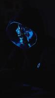 Hacker masked in hoodie exploring dark web on laptop illustrating cyber espionage and digital risk video