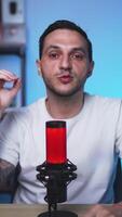 Tattooed Podcaster Speaking to Camera in Stylish Studio Setup video