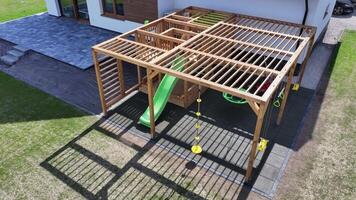 Backyard Playground Structure With Slide and Swing Set Enhances Outdoor Fun for Children in a Spacious Environment video