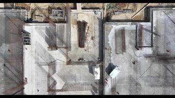 Construction Process of a New Building Project in a City Area Showing Rebar Installation and Groundwork in Progress video
