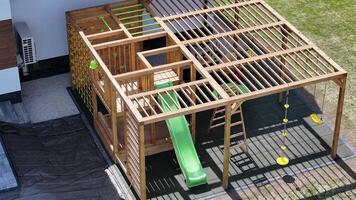 New Playground Structure in Backyard Features Slide and Climbing Elements for Kids to Enjoy Outdoor Playtime video