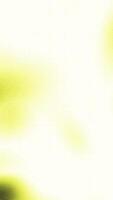 A yellow and green background with a blurred effect video