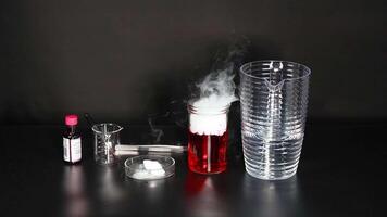 Dry ice reacts with red liquid, creating vapor video
