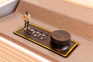 Miniature Thief Cracking Safe Lock Combination 1 photo