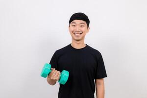 Asian man hold dumbbell for exercise happy smile isolated photo