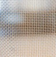 grid with a pattern of numerous small shaped cells, close view photo