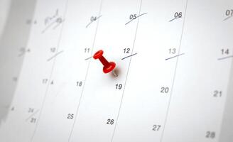 Red pin on calendar. concept of appointment important date notification an appointment with your doctor or schedule a meeting, with copy space for business design photo