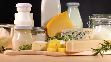 Various dairy items arranged on a wooden board video