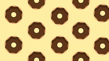 Chocolate donuts arranged in a repeating pattern on a light brown background, forming a simple and delicious dessert-themed design element. video