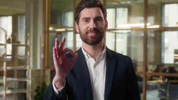 Smiling businessman business man portrait ok sign hand gesture in office Caucasian middle-aged guy male employer happy satisfied manager corporate success broker trader approval good recommend okay video