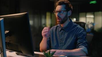 Caucasian man business businessman overwork sleepy guy male workaholic in night evening office overtime work computer tired exhausted yawning low energy late time insomnia sleep yawn health burnout video