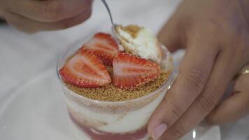 Strawberry dessert preparation in a cozy setting video