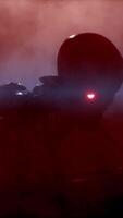 3d render. Scary skeleton with glowing eyes is crawling in the fog right at you. video