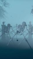 3d render. Dancing skeletons in the cemetery at night. Skeletons with red burning eyes video
