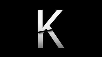 Letter K with slice effect typography. Black solid and green screen background. 4k video