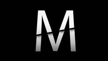Letter M with slice effect typography. Black solid and green screen background. 4k video