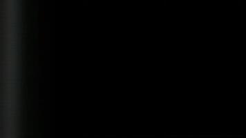 Abstract Glitch Texture with Digital Noise and Interference Error on Black Background Damaged Tv Screen Effect. seamless looping 4k animation background video