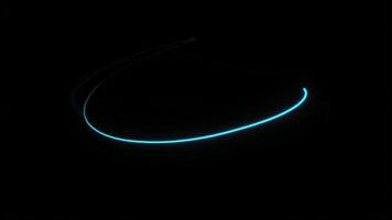 Abstract Cyan Light Painting with Circular Motion and Dynamic Trails Against Black Backdrop Creates a Futuristic and Technological Composition. seamless looping 4k animation background video