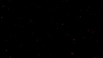 Dynamic Overlay of Golden Fire Sparks Against a Dark Background For Visual Effects and Texture Enhancement. seamless looping 4k animation background video