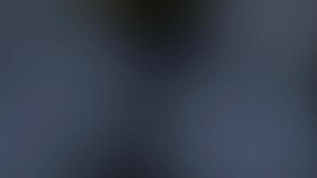 Subtle Gradient Blur Background in Shades of Gray and Blue for Graphic Design Projects and Visual Effects. seamless looping 4k animation background video
