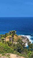 view of Promthep Cape, the southernmost point of Phuket Island, Thailand. Panoramic seascape with turquoise ocean. Famous tourist destination for breathtaking coastal scenery. video