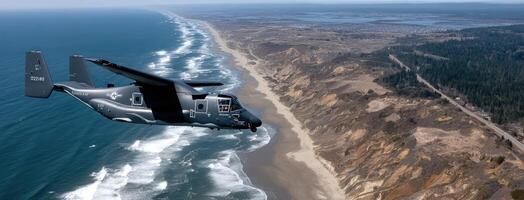 A military helicopter flying over the ocean near the shore photo