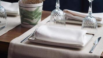 Elegant dining setup featuring neatly arranged tableware video