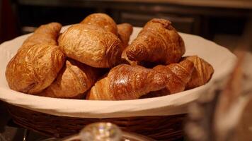Freshly baked croissants in a cozy bakery setting video