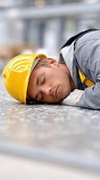 A man sleeping on the floor photo