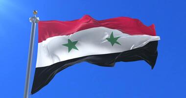 Flag of Syria waving at wind with blue sky in slow, loop video