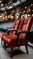 Two red chairs sitting in a row photo
