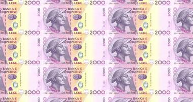 Banknotes of two thousand albanian lek of Albany rolling, cash money, loop video