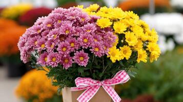 A bouquet of flowers in a paper bag photo