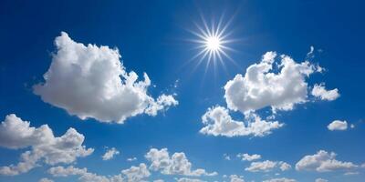 Blue sky filled with fluffy white clouds on a bright sunny day photo