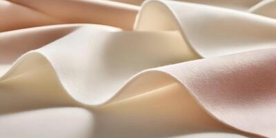 Cream and Beige Fabric Texture Close Up Soft Draped Textile Material photo