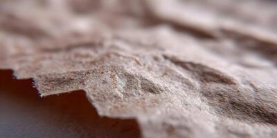 Close up of crumpled brown paper texture background photo