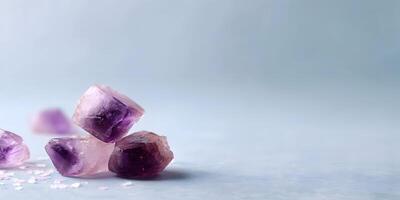 Amethyst Crystal Clusters on Light Blue Background photo