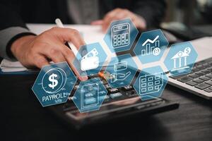 Businessman using calculator to calculate financial data photo