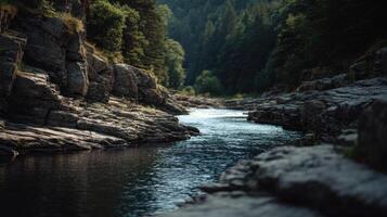 A Serene And Powerful River Through A Rocky Gorge photo